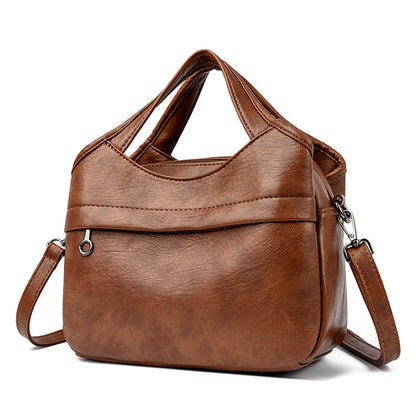 👜Damską torebkę crossbody z miękkiej syntetycznej skóry